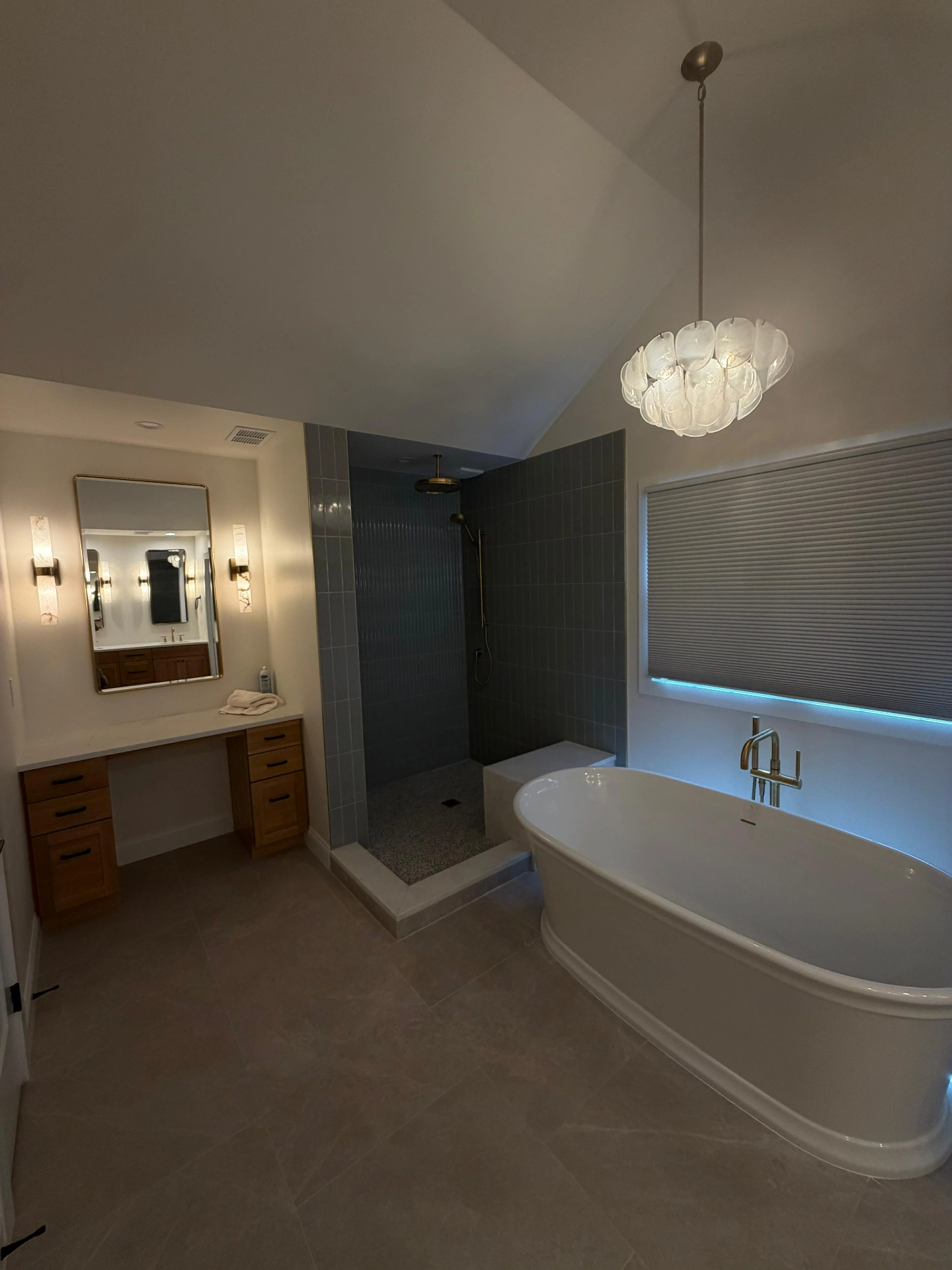 Custom spa master bathroom with freestanding tub, tile shower and double vanity by A1 Brothers